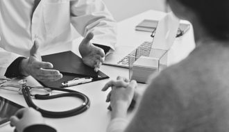 Doctor talking to patient.